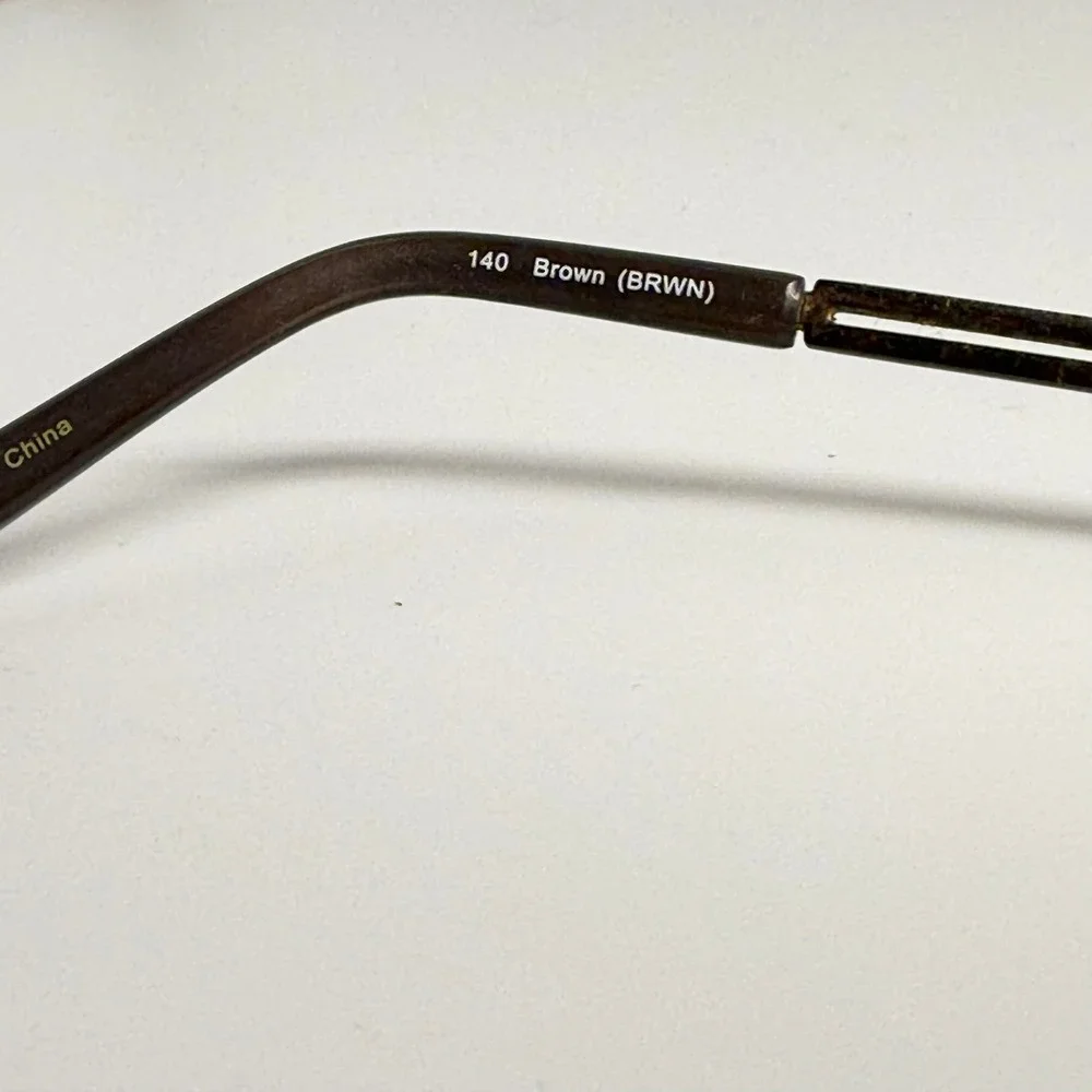 XOXO Flirty Brown Metallic Semi Rimless Cat Eye Eyeglass Frames 52-17-140